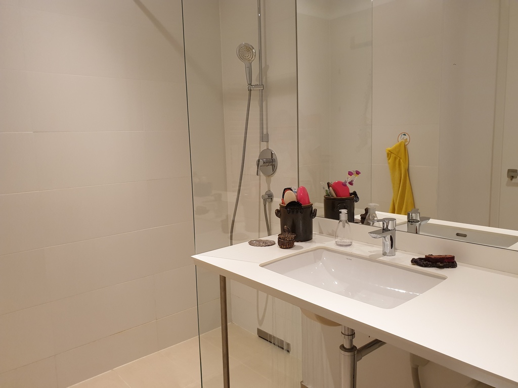 Bathroom 2 with shower and basin, next to bedrooms 2 & 3