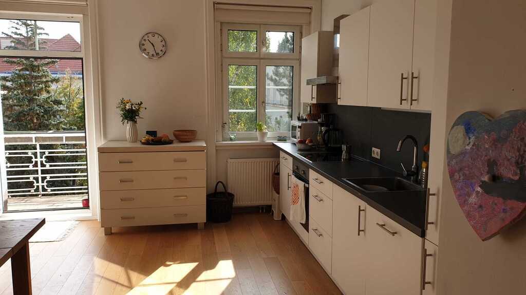 Open-plan kitchen, view towards patio