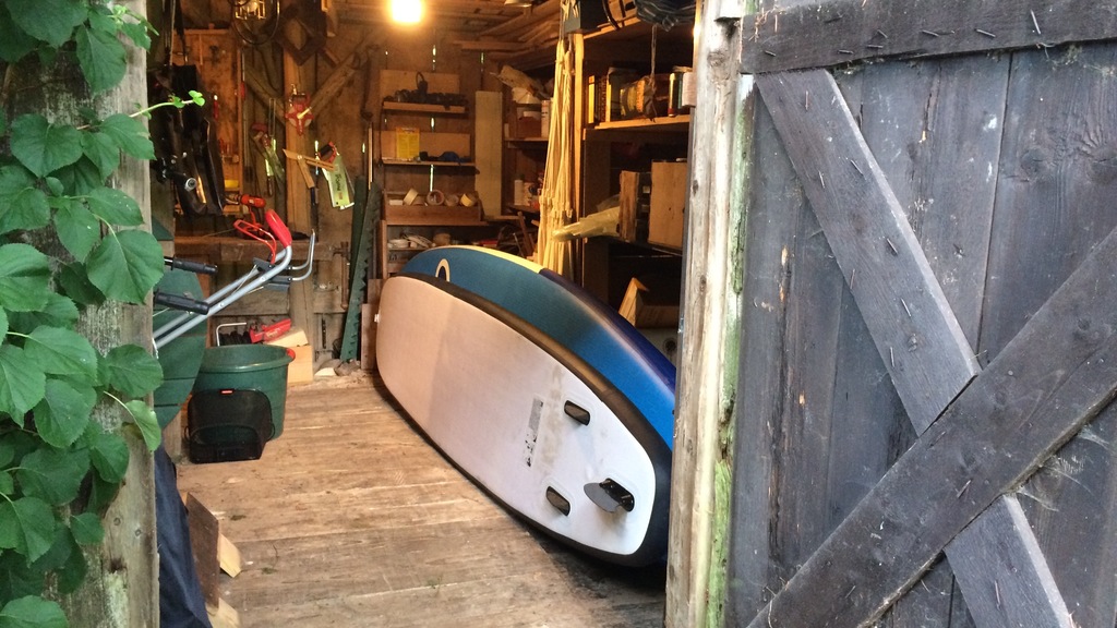 Shed with standup paddles