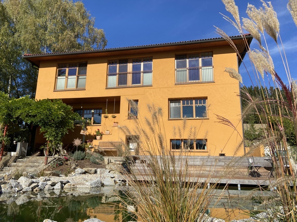Our super comfy house with a wonderful natural swimming pond