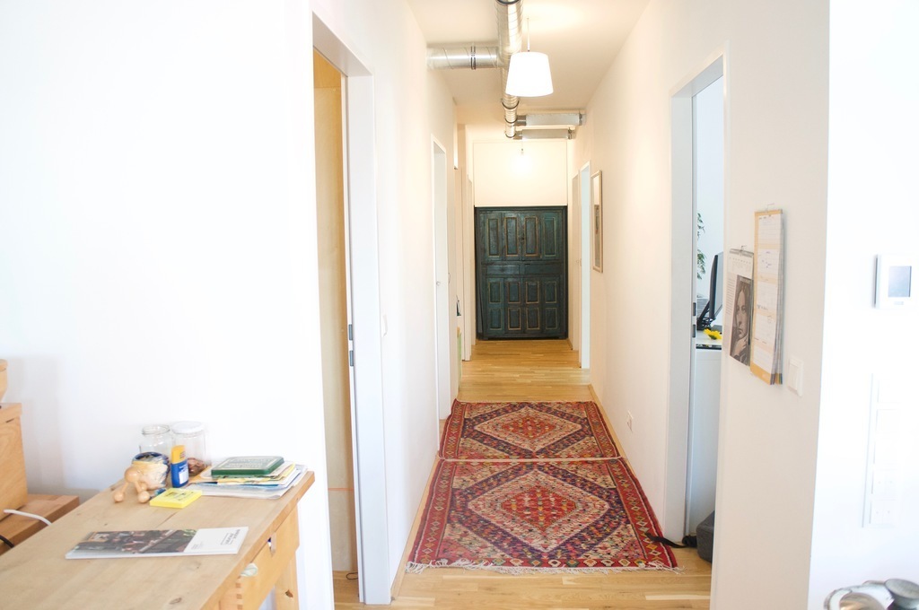 Corridor between bedrooms & bathrooms