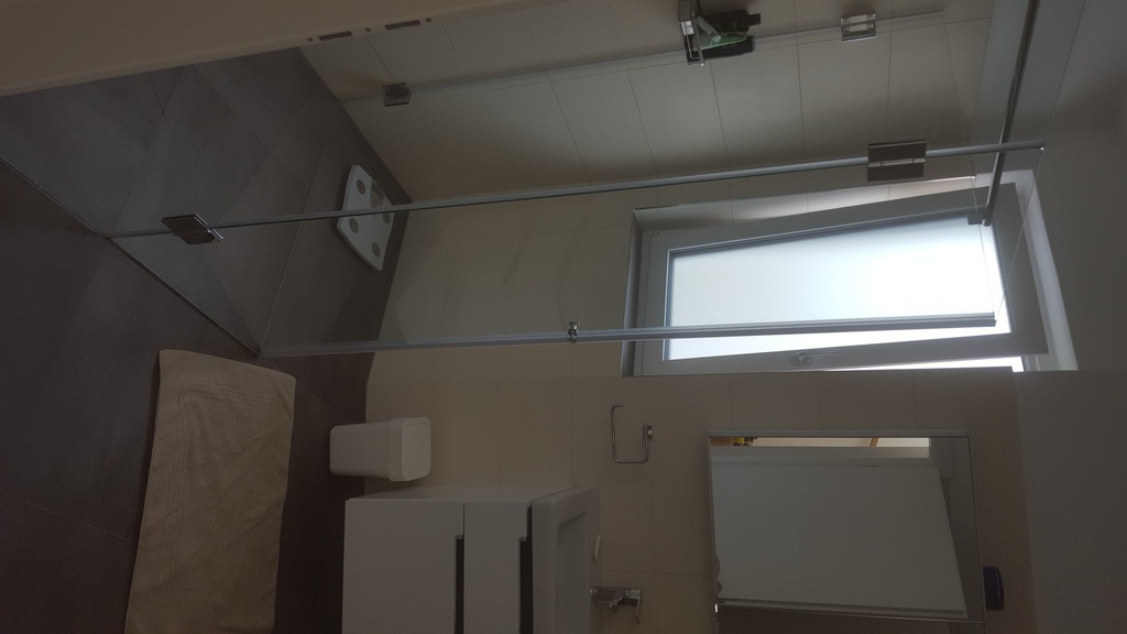 Bathroom with shower and tube