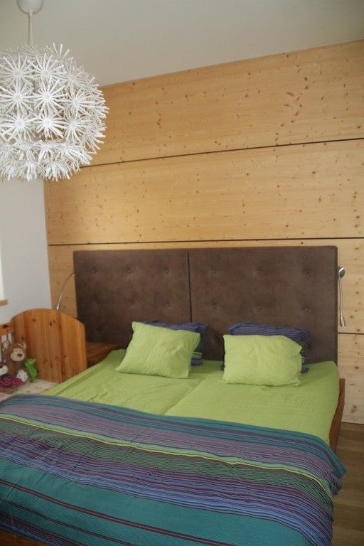 master bedroom with baby bed