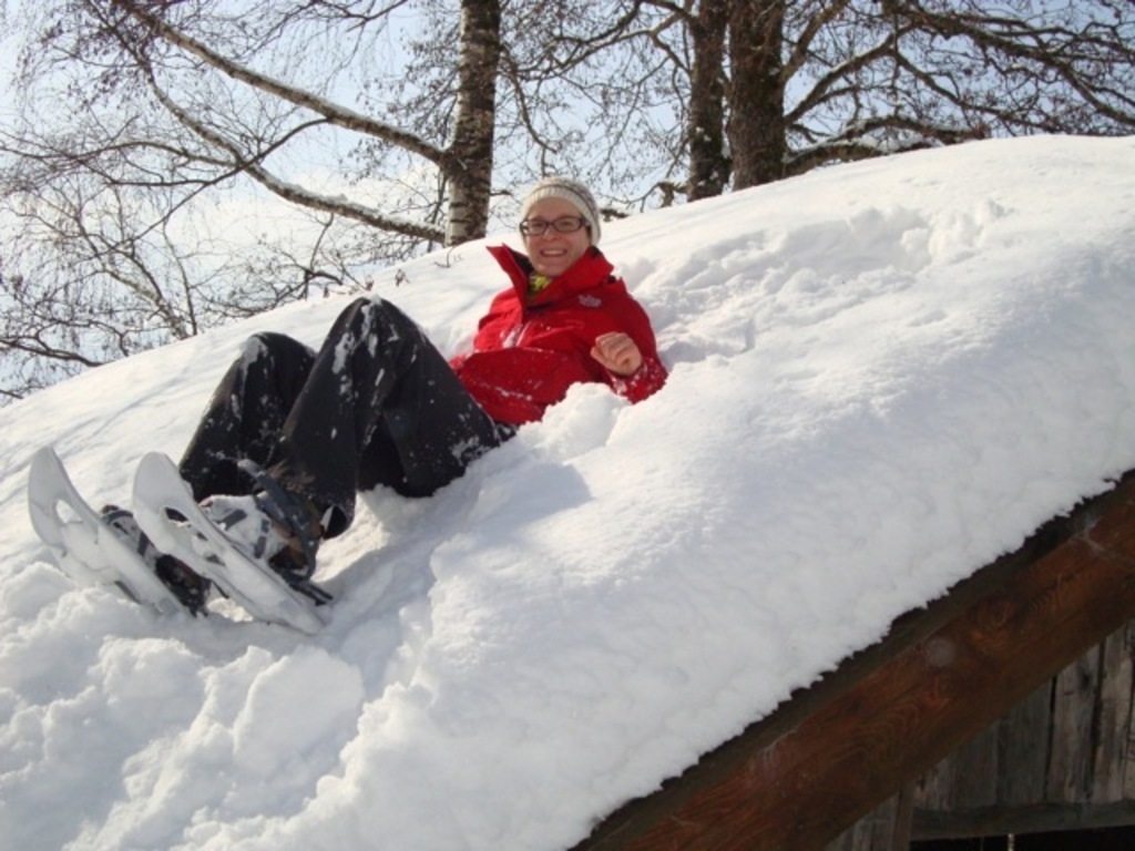 Petra with snowshoes on the roof