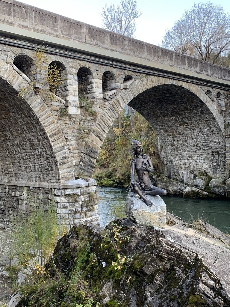Murnau statue on the rock in river Mur