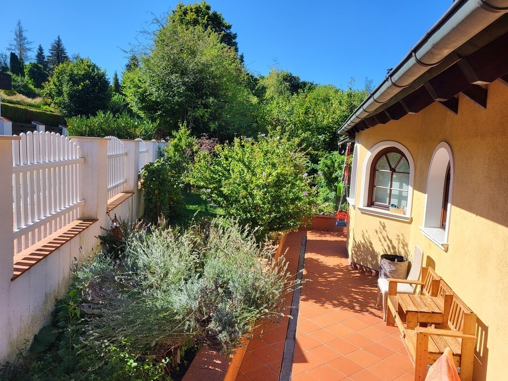 In front of the house