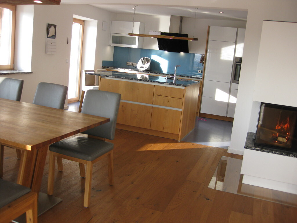 Kitchen with dining area and fireplace