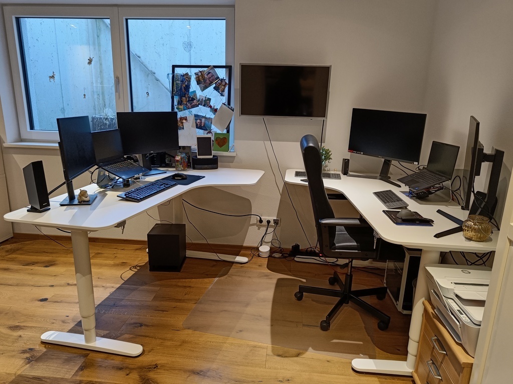 Workspace with four monitors