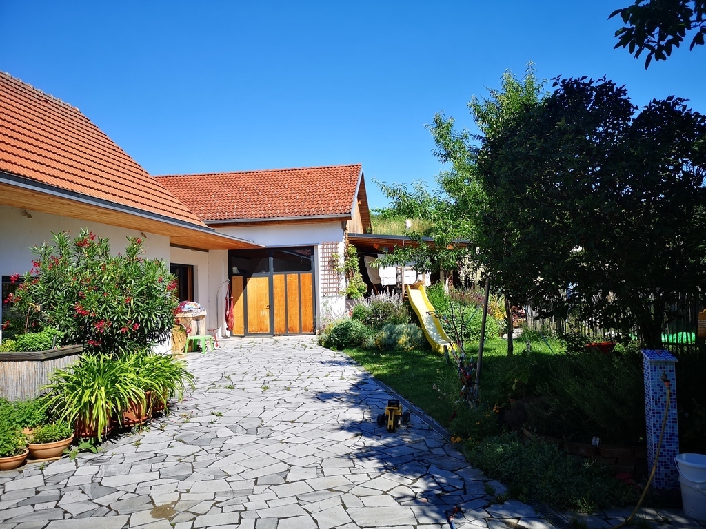 the secluded courtyard of the modern, extended wine-growing house