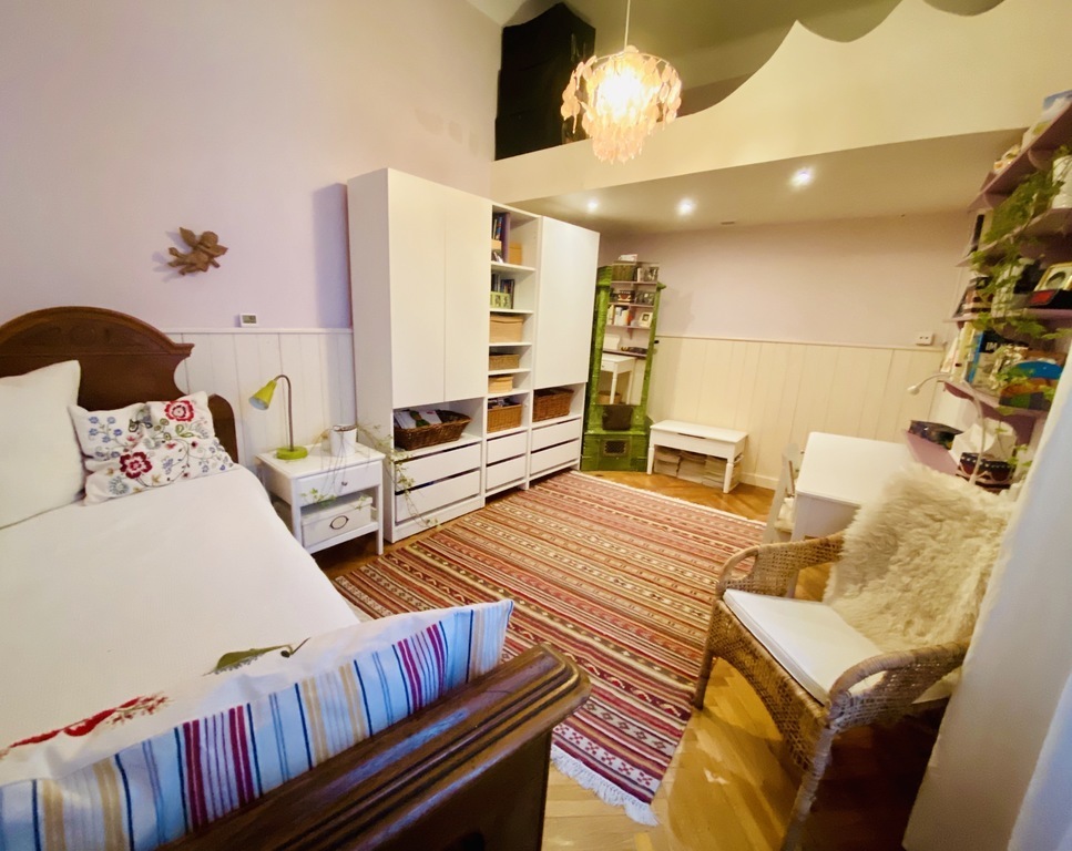 The guest room has a loft bed as well as a single bed.