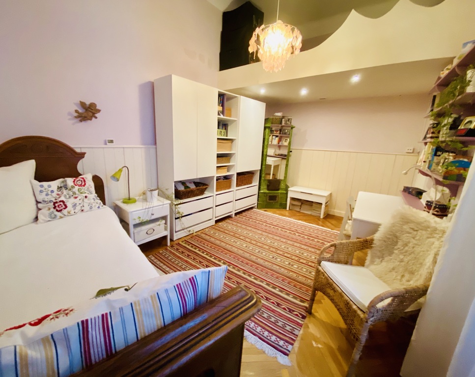 The guest room has a loft bed as well as a single bed.