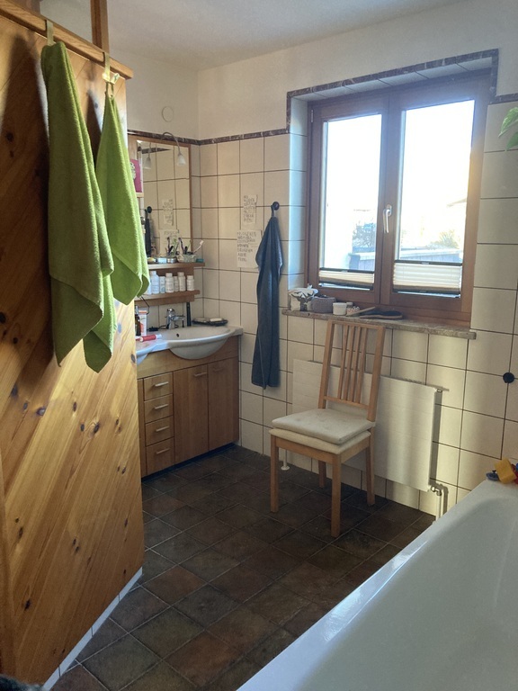 bathroom with shower and bath tub