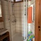 bathroom with shower and bath tub