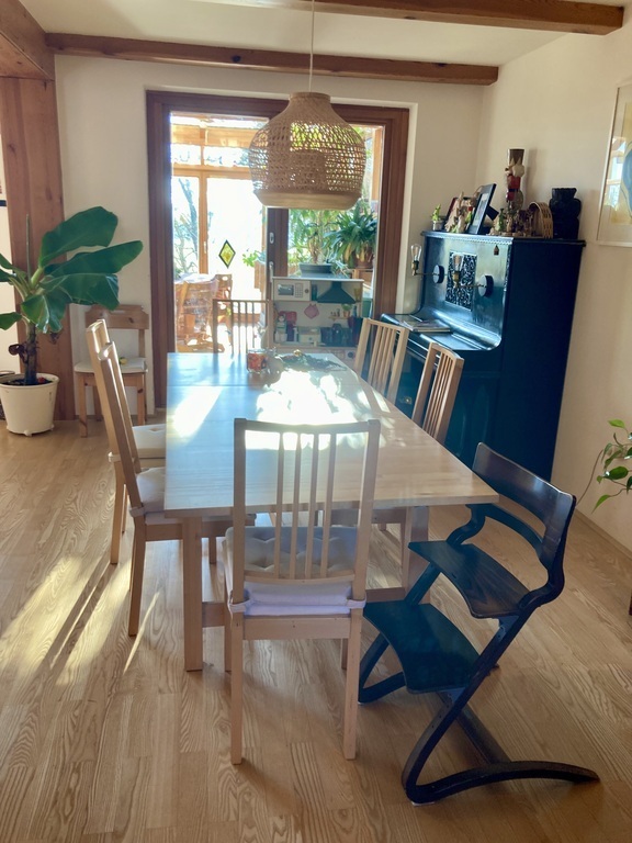 dining area with piano