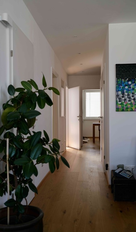 View from kitchen to bedroom (open,left) dining room (straight)