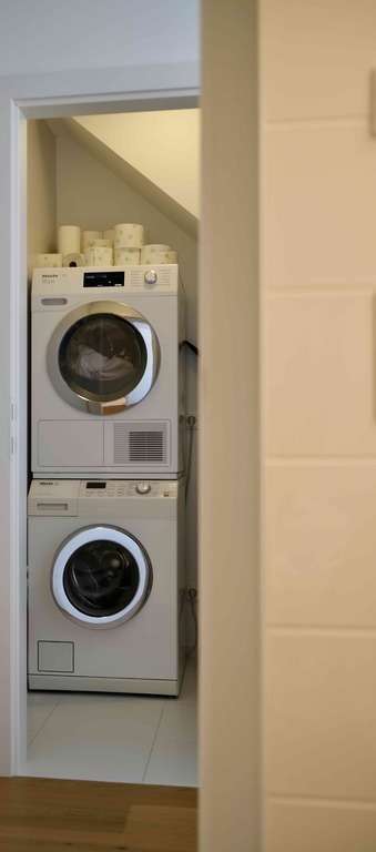 Storage with washing machine and tumble dryer