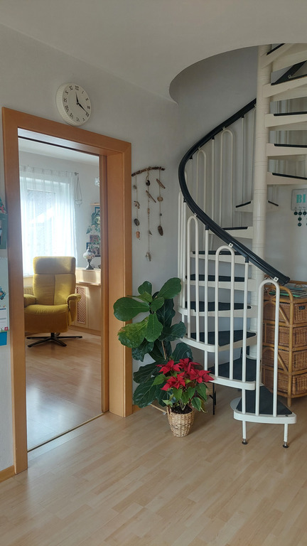 Wendeltreppe zu den Mansardenzimmern