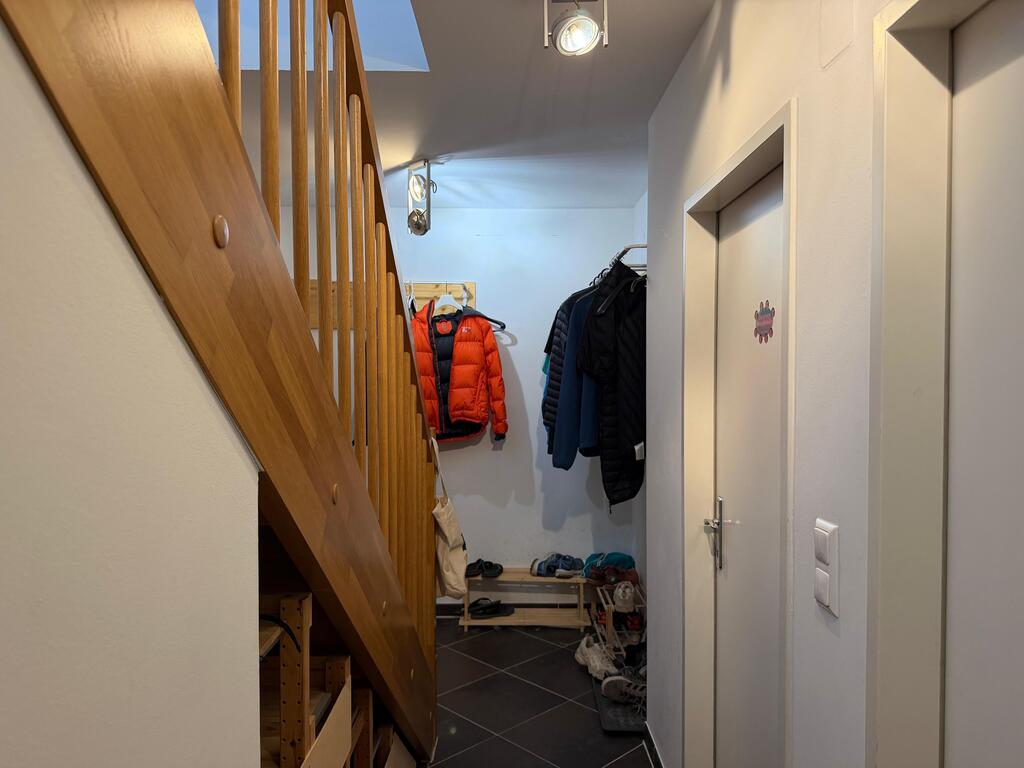 The bedroom downstairs is the room to the right