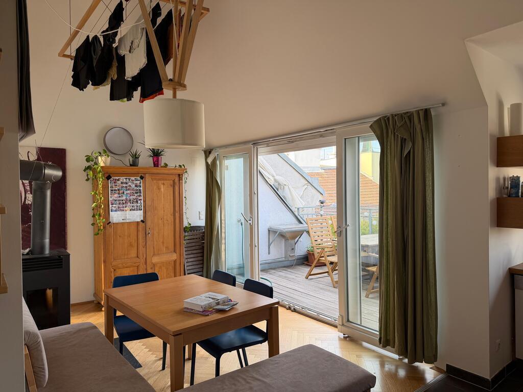 Main room with chimney and terrace
