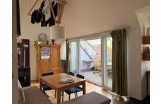 Main room with chimney and terrace