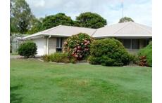 Set on quiet 2000sq metres, half acre, 1 Palm Way
