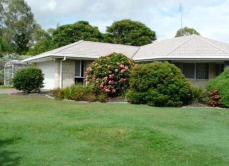 Set on quiet 2000sq metres, half acre, 1 Palm Way