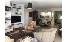 Living room &dining room, kitchen in background 