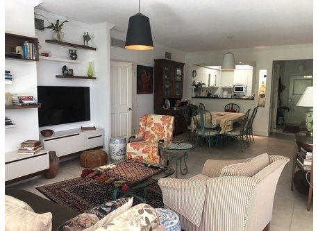 Living room &dining room, kitchen in background 