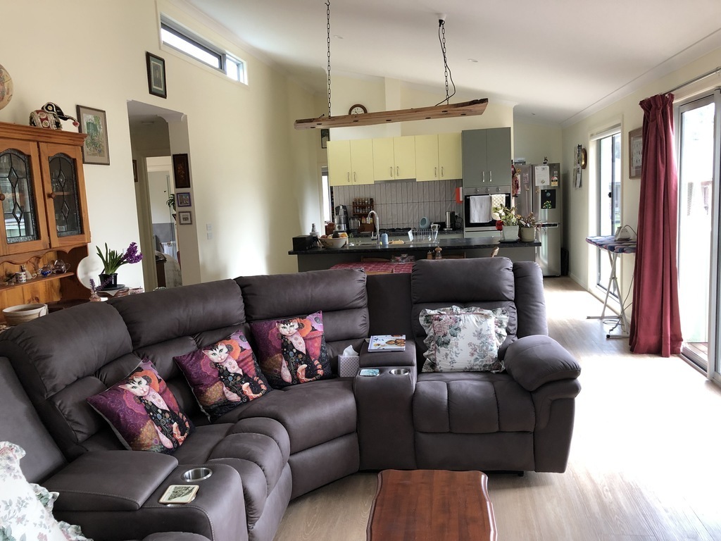 the living area looking towards the kitchen.