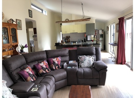 the living area looking towards the kitchen.