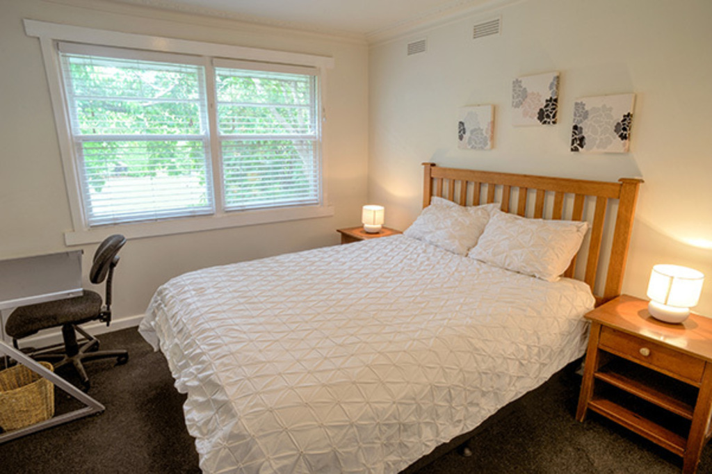 Bedroom #3 looks out onto the front garden