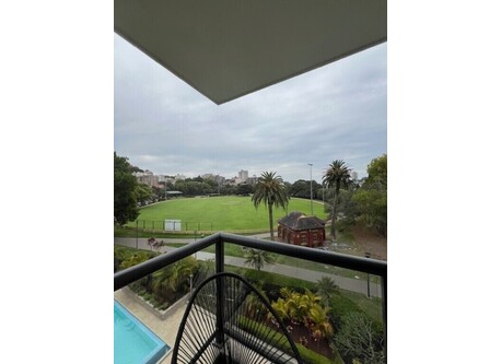 Actual view from the Balcony with Sydney Harbour on the other side of the Oval.