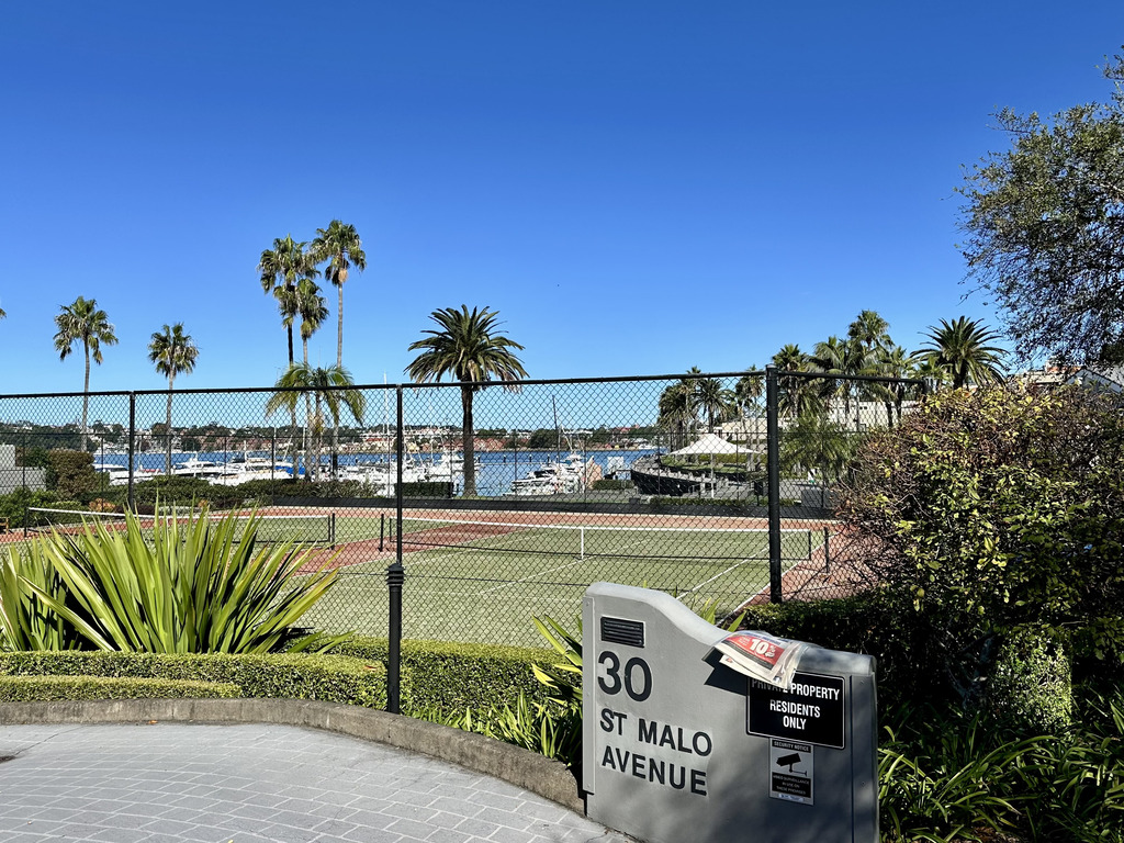 The estate has 2 tennis courts.  There is a second Harbourside pool behind the courts, and the marina is beyond this.