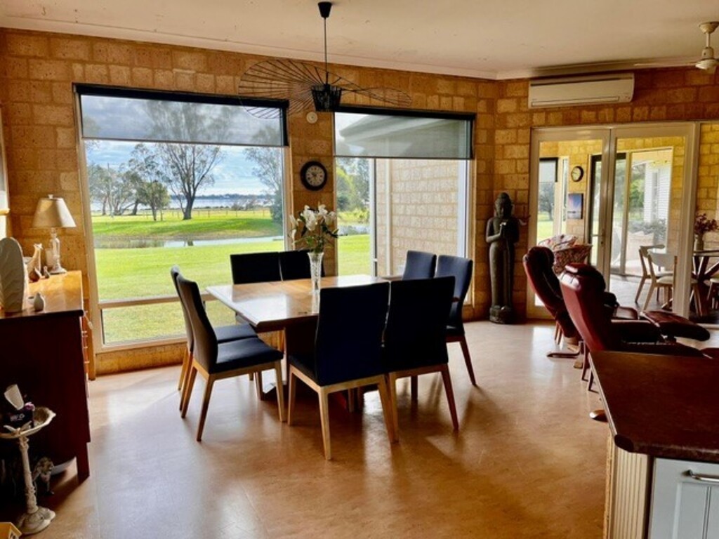 combined dining lounge area all with lake views