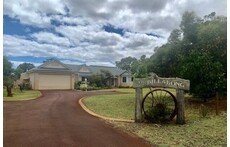 Street view, lock up garage with internal entry to the house.