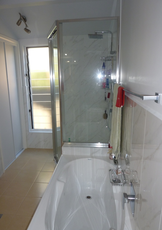 Main bathroom with shower and bath - there is a second bathroom with shower only