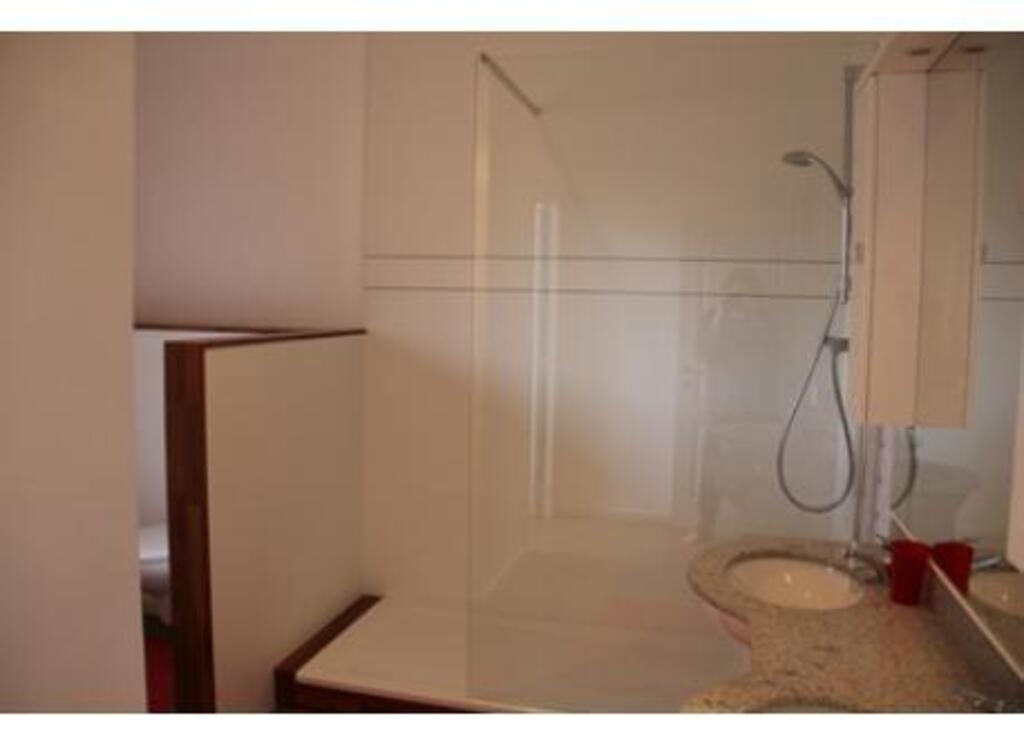 bathroom with walk-in shower