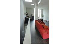big sitting area + kitchen in loft style