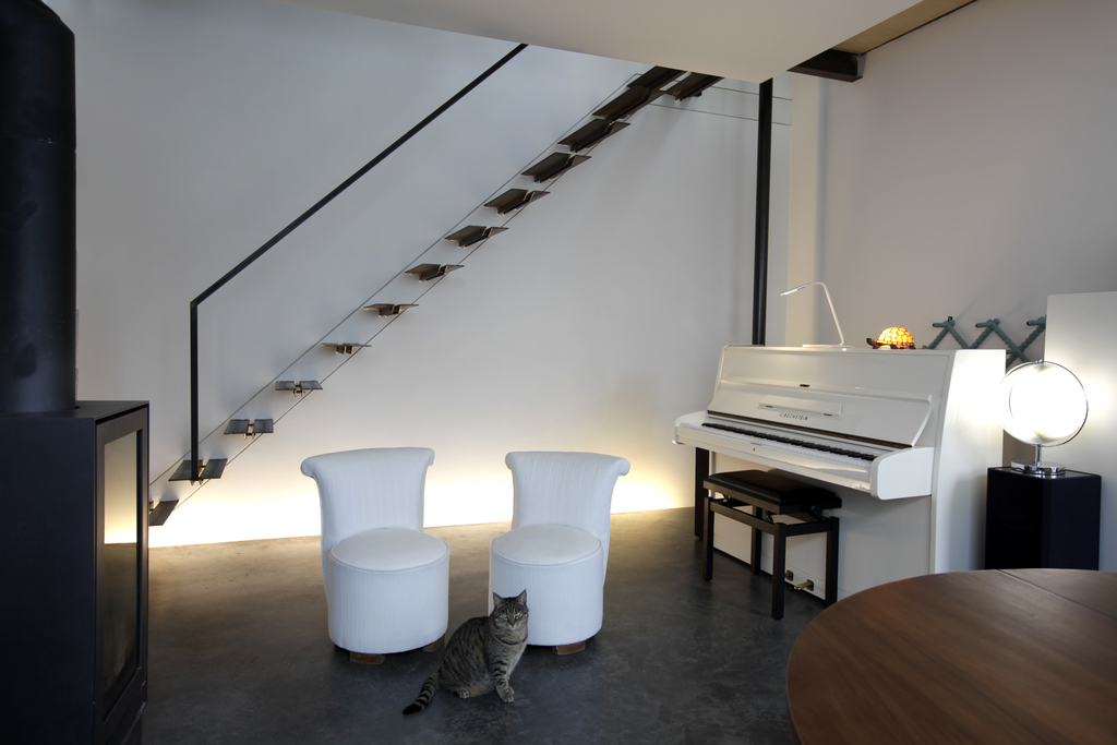 Ground floor, dining room and sitting area next to the stove