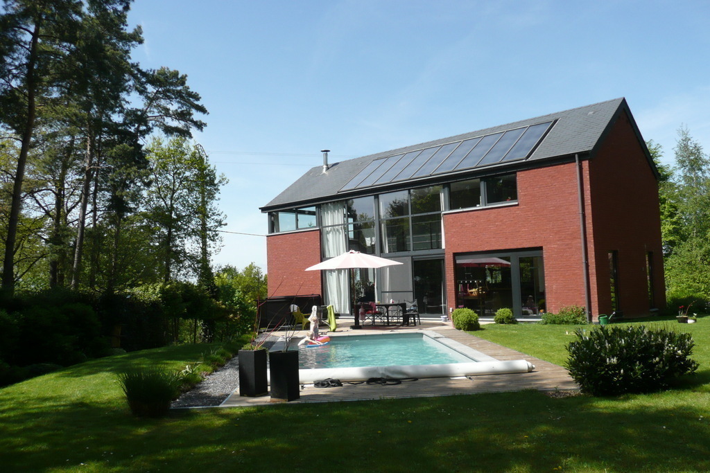 Back of the house with a large garden in a green and quite area 