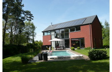 Back of the house with a large garden in a green and quite area 