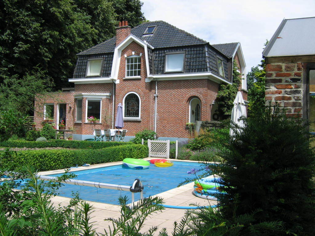 Swimming pool in back garden
