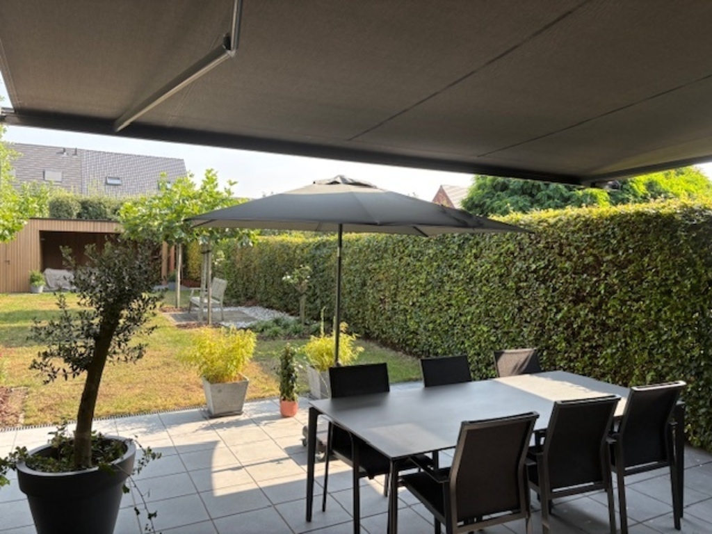 Terrace with electric awning