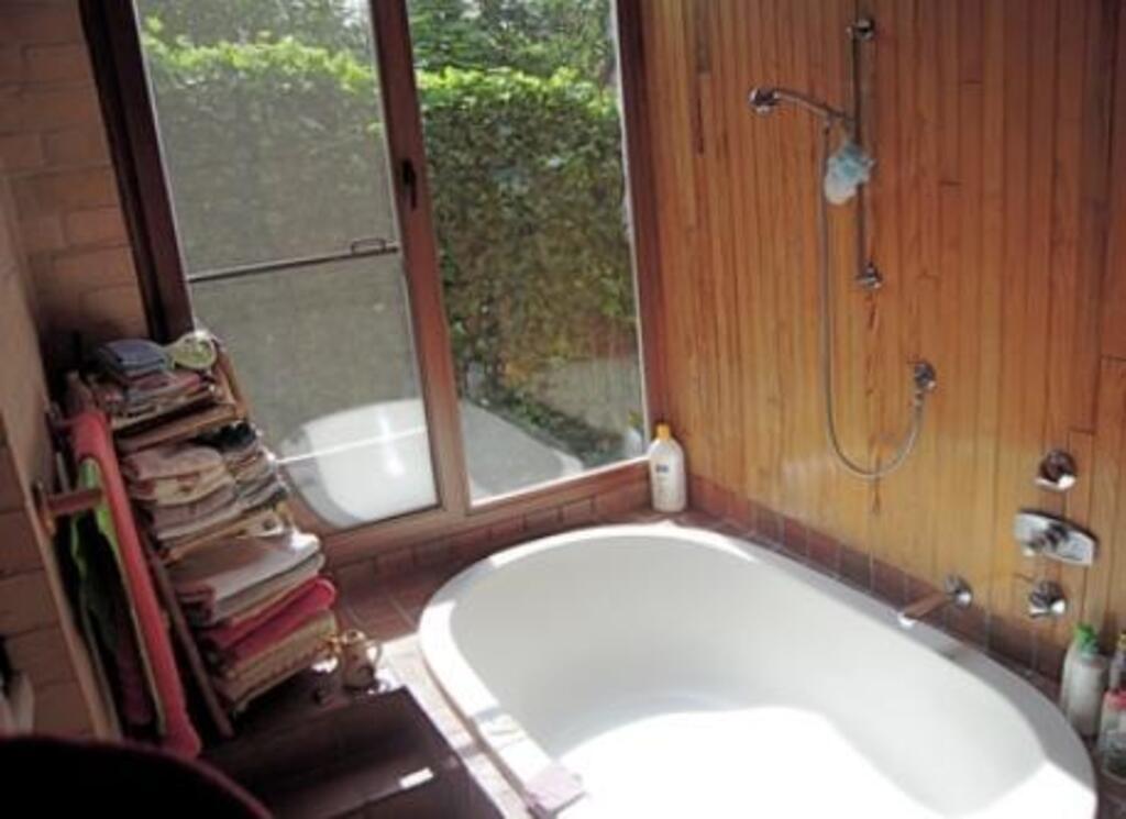 bathroom downstairs (entrance to sauna not visible)