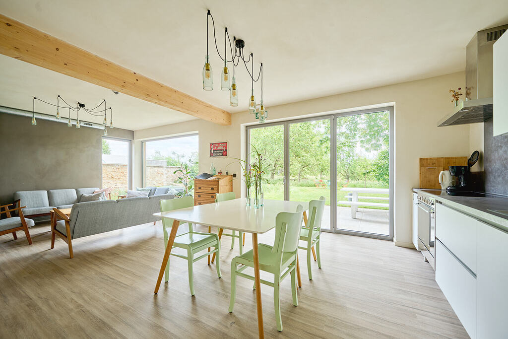 Spacious living room and modern kitchen.