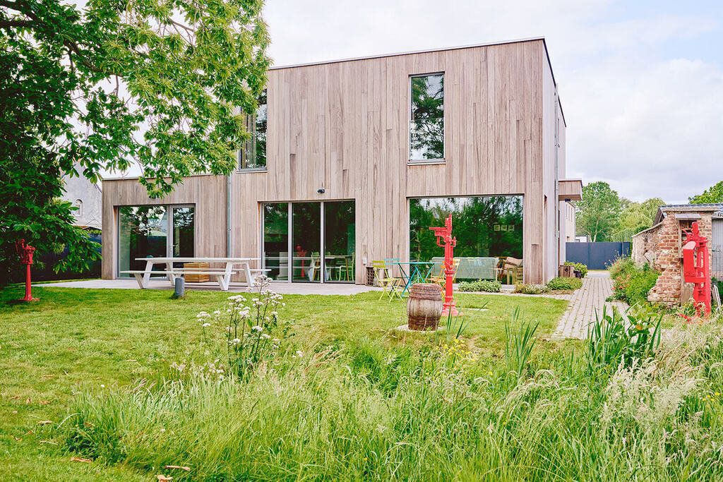 The back of our house, with big terrace and view over the garden.