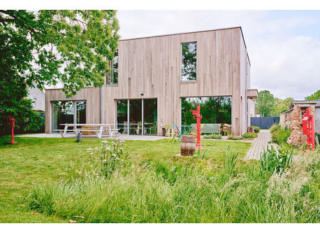The back of our house, with big terrace and view over the garden.