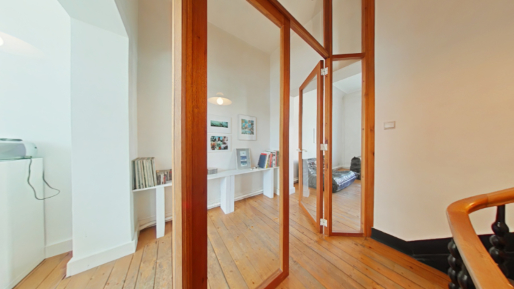 First floor: glass door to the living room and kitchen