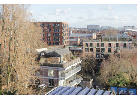View from the balcony onto the PAKT-site, a vibrant complex with restaurants, bars and offices.