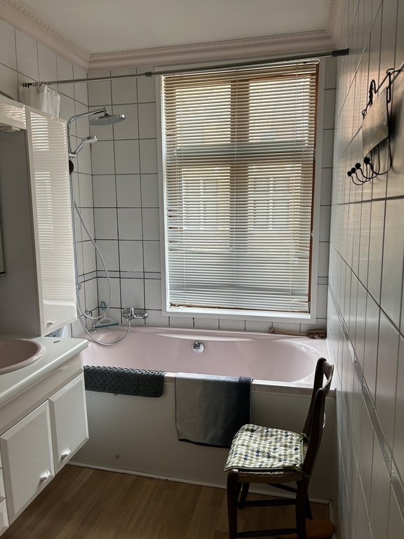 Bathroom next to the master bedroom .